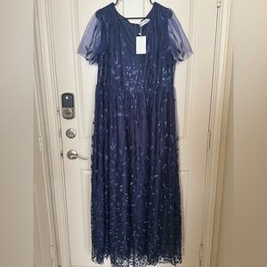 Elegant Navy Blue Gown with Sheer Sleeves